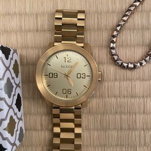 Men’s Gold Nixon Corporate Stainless Steel watch.
